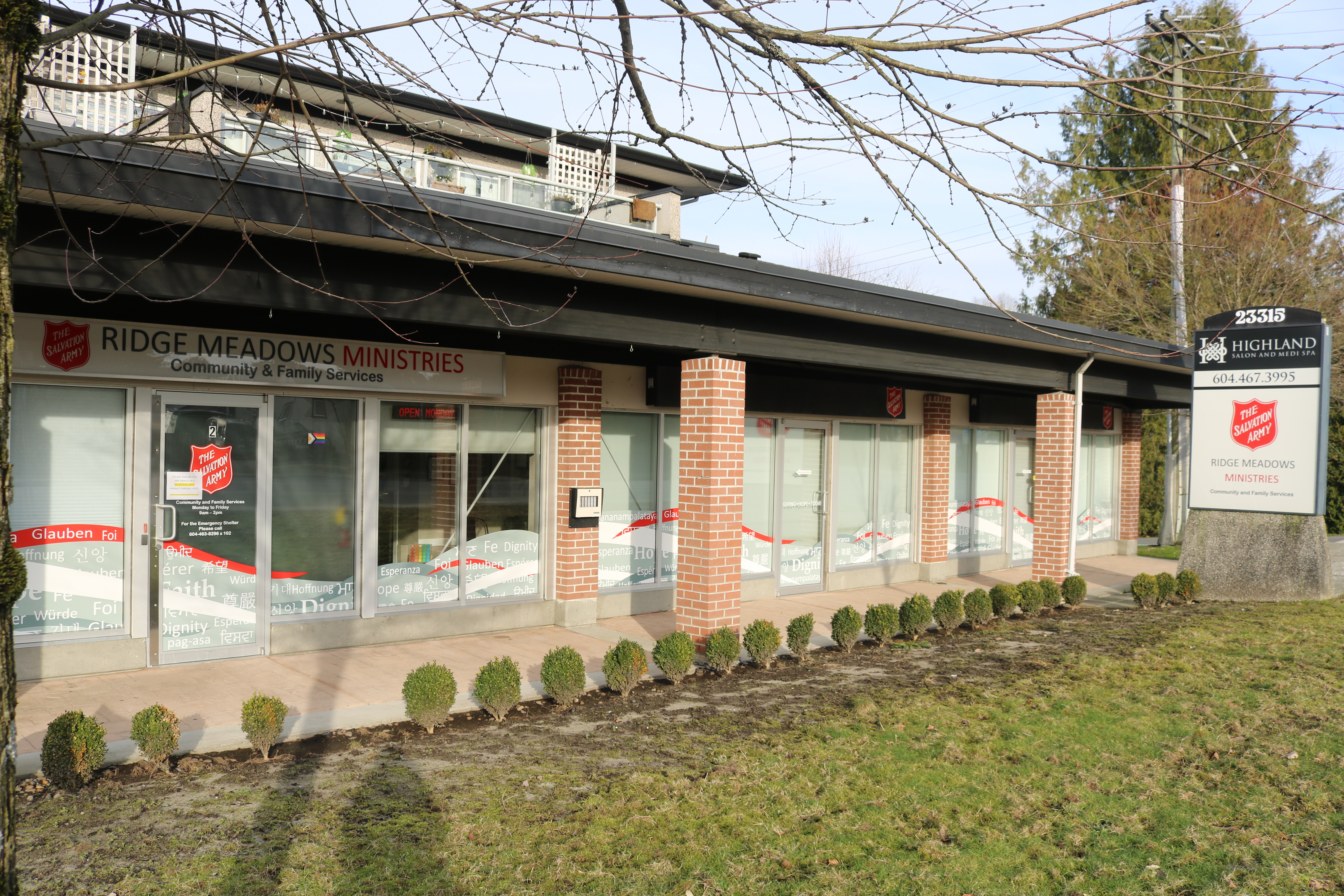 Exterior view of the Ridge Meadows Ministries building, showing the main entrance and Salvation Army signage.